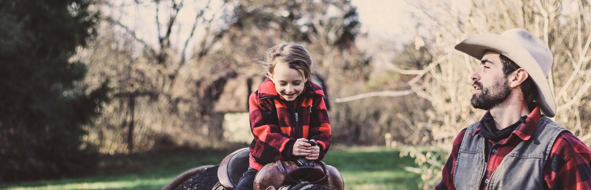 A foster parent and child outdoors